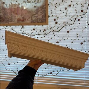 White grecian style floating shelf